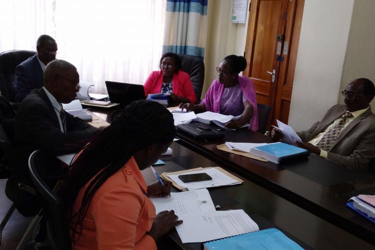 Prof. Charles Rambo chairing  the defense for Mr. Matu's PhD thesis, while Prof. Kyalo, Dean School of Open, Distance Learning plays the role of Internal Examiner during the PhD Oral Examination at the ODeL Campus Boardroom on Thursday, March 12, 2020 